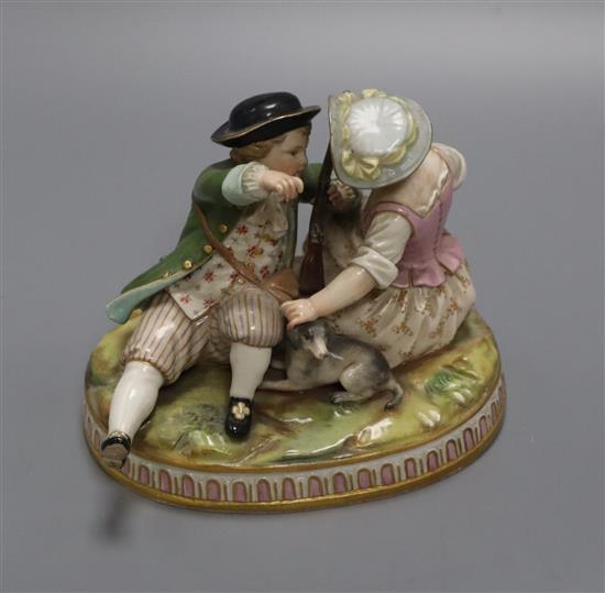 A Meissen group of a boy and a girl height 10cm